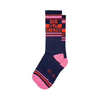 side view of a pair of blue socks with pink and orange stripes that say "big clit energy".