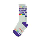 Pair of light grey crew socks with purple cuffs. Design includes 'Proud Gay Dad' text and rainbow hearts.