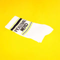 Close-up of a single Pickleball Nerd sock on a yellow background. [lf]