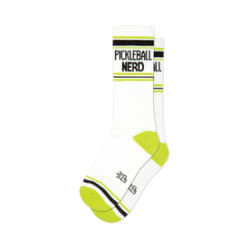 front view of a pair of white athletic socks with black and lime green stripes and the words "pickleball nerd" in black.