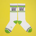 Lifestyle shot of Golf Nerd socks, worn by an unseen person. [lf]