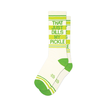 front view of a pair of white crew socks with green and yellow stripes and the words "that just dills my pickle" printed on them.