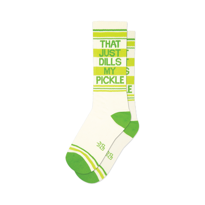 front view of a pair of white crew socks with green and yellow stripes and the words "that just dills my pickle" printed on them.