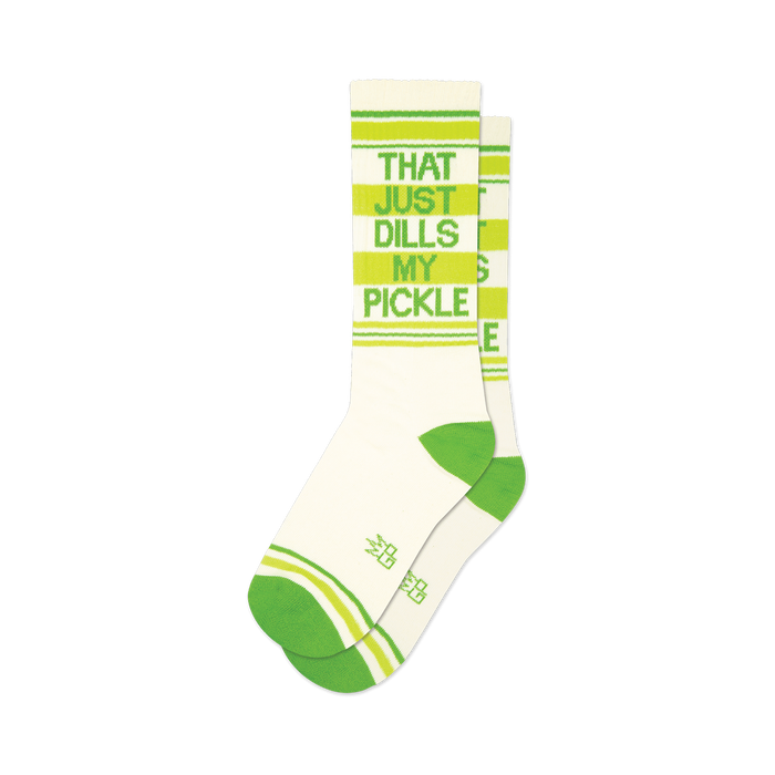 front view of a pair of white crew socks with green and yellow stripes and the words 