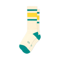 Pair of cream crew socks with green and gold stripes and teal cuffs. 