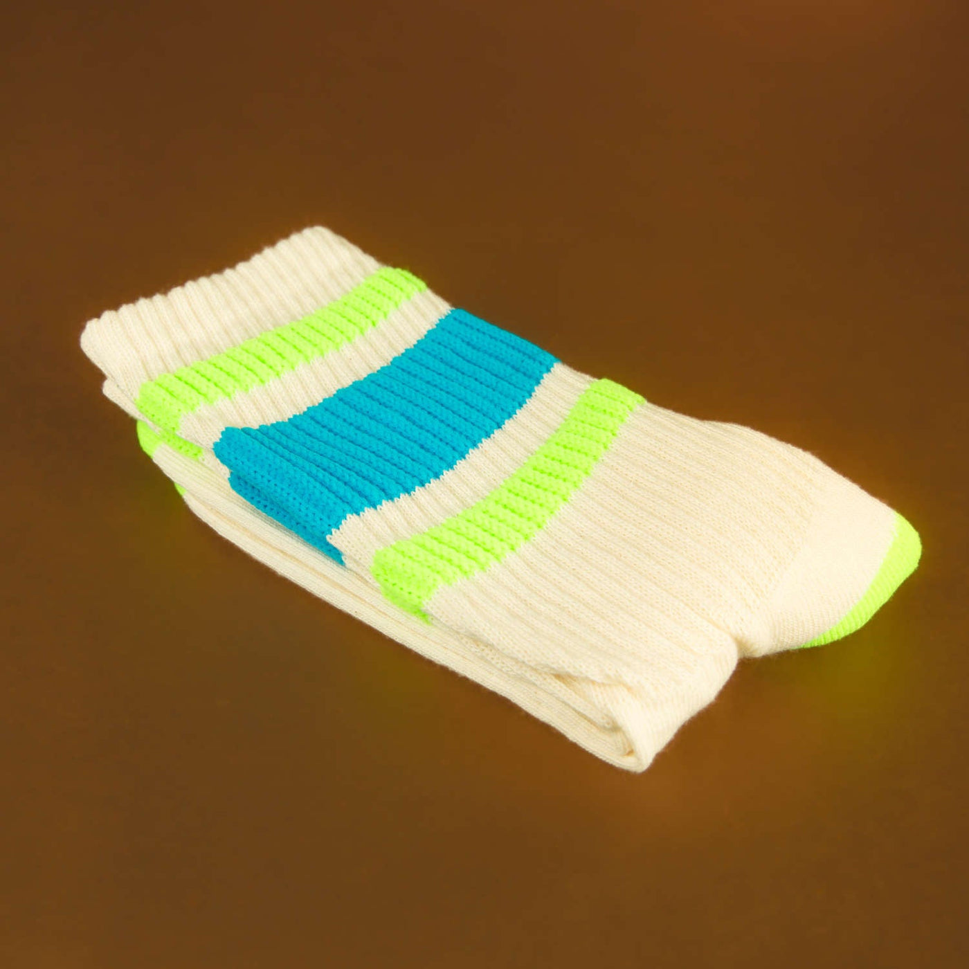 Close-up of Peter socks folded on a brown surface. [lf]