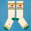 Another flat lay of 'I Heart Cowgirls' socks, showcasing design details.