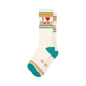 front view of a pair of white crew socks with teal, brown, and yellow stripes and the words 