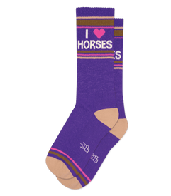 front view of purple socks with "i love horses" written in white with a pink heart.