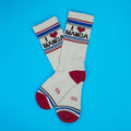 Flatlay of 'I Heart Manga' crew socks on a blue background.