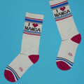 Another flatlay of the 'I Heart Manga' crew socks on a blue background.