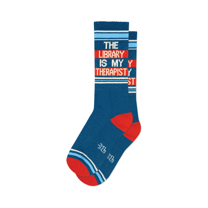 front view of a pair of blue socks with red and white stripes that say 