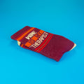 Close-up of a single folded sock, highlighting the text and colors. [lf]