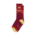 Pair of burgundy crew socks with orange and yellow stripes and the text 'Wine Is My Therapist'.
