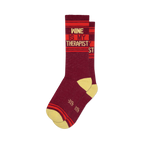 Pair of burgundy crew socks with orange and yellow stripes and the text 'Wine Is My Therapist'.