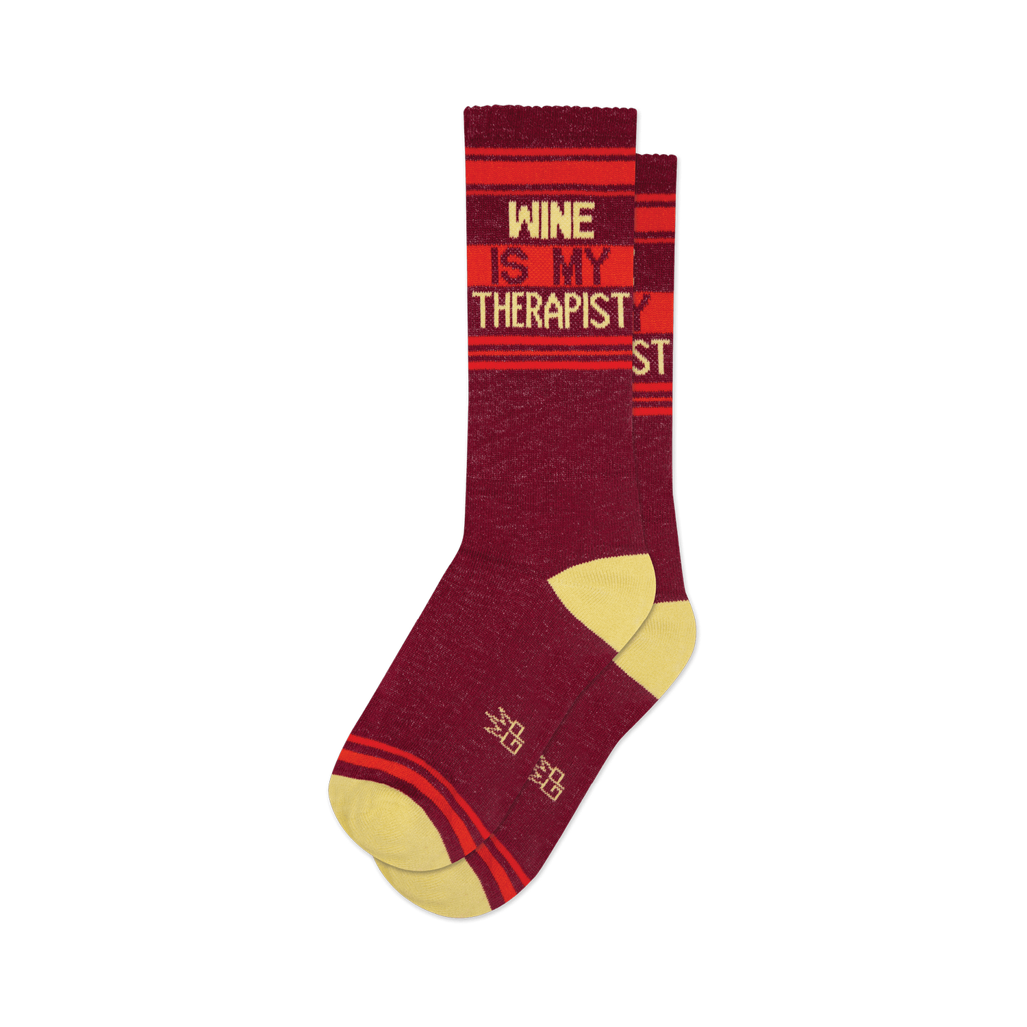 Pair of burgundy crew socks with orange and yellow stripes and the text 'Wine Is My Therapist'.