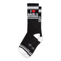 Pair of black crew socks with a white and red 'I Heart Bagels' design.  Features white stripes and a subtle sparkly texture.