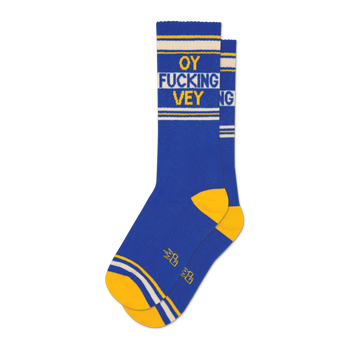 Pair of blue crew socks with yellow and white stripes and the phrase 'OY FUCKING VEY' in yellow lettering.