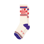 Pair of off-white crew socks with purple and red stripes.  'I Heart Romance Novels' is written in red on the socks.