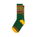 Pair of green crew socks with a repeating 'Guacamole' pattern in yellow, red, and pink. Yellow and red stripes at the top and bottom.