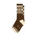 Chocolate brown crew socks with "Chocolate Is My Therapist" in white text, cream accents, and white stripes.