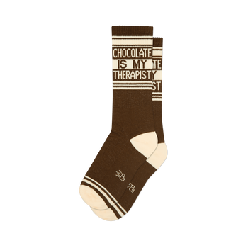 Chocolate brown crew socks with "Chocolate Is My Therapist" in white text, cream accents, and white stripes.