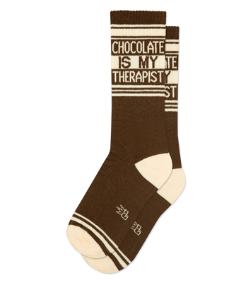 Brown crew socks with off-white stripes and the text 'Chocolate Is My Therapist.'