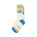 Cream Candy crew socks with rainbow text, a colorful checkered cuff, and bright blue toe & heel.