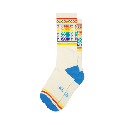 Cream Candy crew socks with rainbow text, a colorful checkered cuff, and bright blue toe & heel.