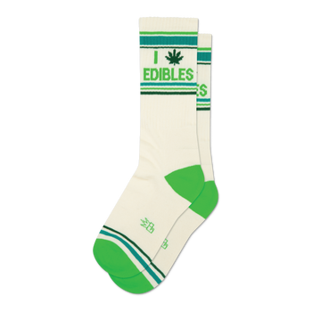 Pair of cream crew socks with green and teal stripes and a marijuana leaf with 'I Edibles' text.