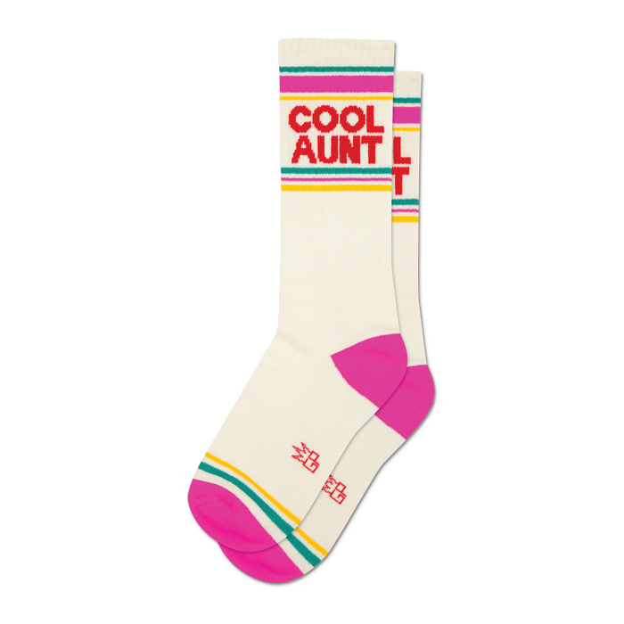 Pair of off-white crew socks with hot pink, teal, and gold stripes and 'COOL AUNT' in red text.