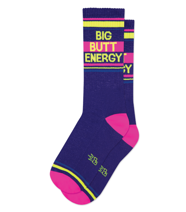 Pair of purple crew socks with neon pink and yellow stripes and the words 'BIG BUTT ENERGY' printed on them.