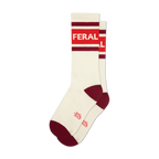 Pair of cream-colored crew socks with red and burgundy stripes and the word 'FERAL' in bold white lettering.