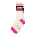 Cream tube socks with "CUNT" in white on a maroon stripe, flanked by fuchsia stripes. Fuchsia heel and toe.