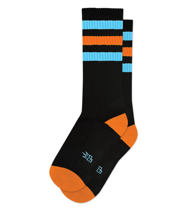 Pair of black crew socks with orange and light blue retro stripes. Orange accents at the heel and toe.