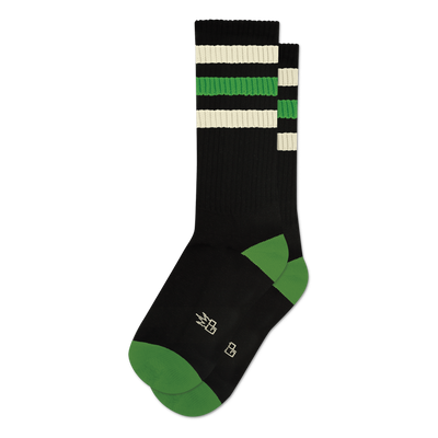 Pair of black crew socks with green and off-white retro stripes. Green accents at the heel and toe.