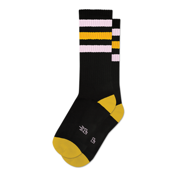 Pair of black crew socks with pink and gold retro stripes. Yellow heel and toe. 