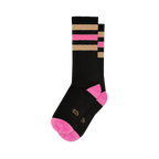Pair of black crew socks with pink and beige retro stripes.  Pink accents at the heel and toe. Small logo on the sole.