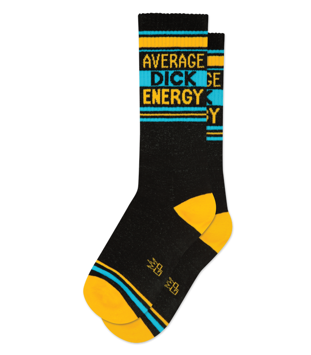 Pair of black crew socks with gold and teal stripes and the phrase 'Average Dick Energy' written vertically.