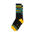 Pair of black socks featuring "Average Dick Energy" in alternating yellow and blue, with yellow toes, heels, and accent strip