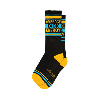 Pair of black socks featuring "Average Dick Energy" in alternating yellow and blue, with yellow toes, heels, and accent strip