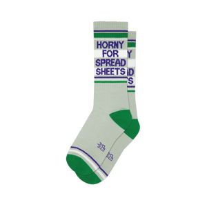 Pair of grey crew socks with green and purple stripes.  Text reads 'Horny for Spreadsheets'.