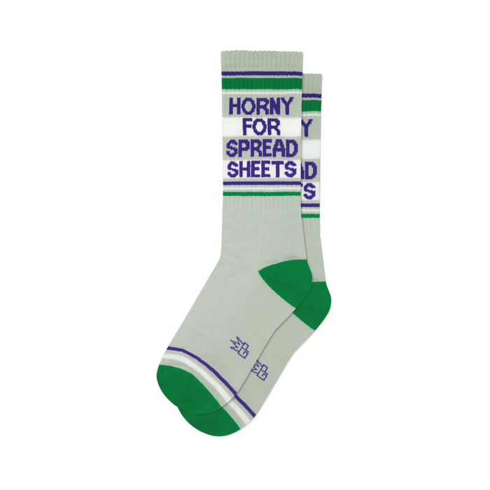 Pair of grey crew socks with green and purple stripes.  Text reads 'Horny for Spreadsheets'.