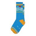 Pair of blue crew socks with a retro design. Features 'I Heart Peanut Butter' text, red heart, and gold accents.
