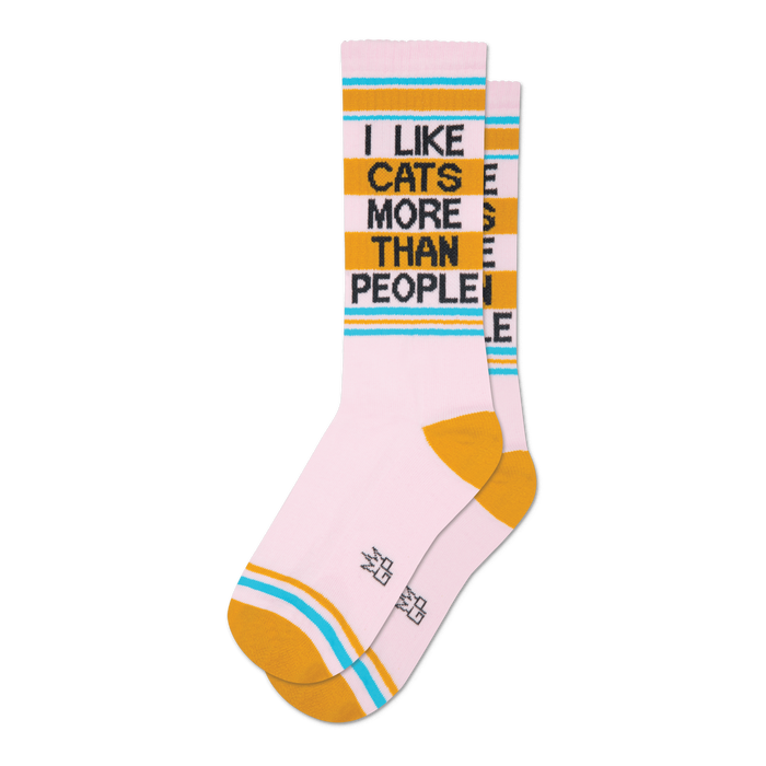 Pair of crew socks in pink with gold and teal stripes. Text reads: 'I LIKE CATS MORE THAN PEOPLE'.
