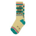 Pair of cream crew socks with teal and pink stripes and the text 'I LIKE DOGS MORE THAN PEOPLE' in brown.