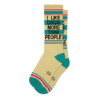 Pair of cream crew socks with teal and pink stripes and the text 'I LIKE DOGS MORE THAN PEOPLE' in brown.