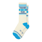 Pair of off-white crew socks with blue stripes and 'Teacher of the Year' text. 