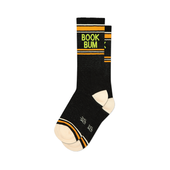 Pair of black crew socks with orange and lime green stripes and 'BOOK BUM' text. 