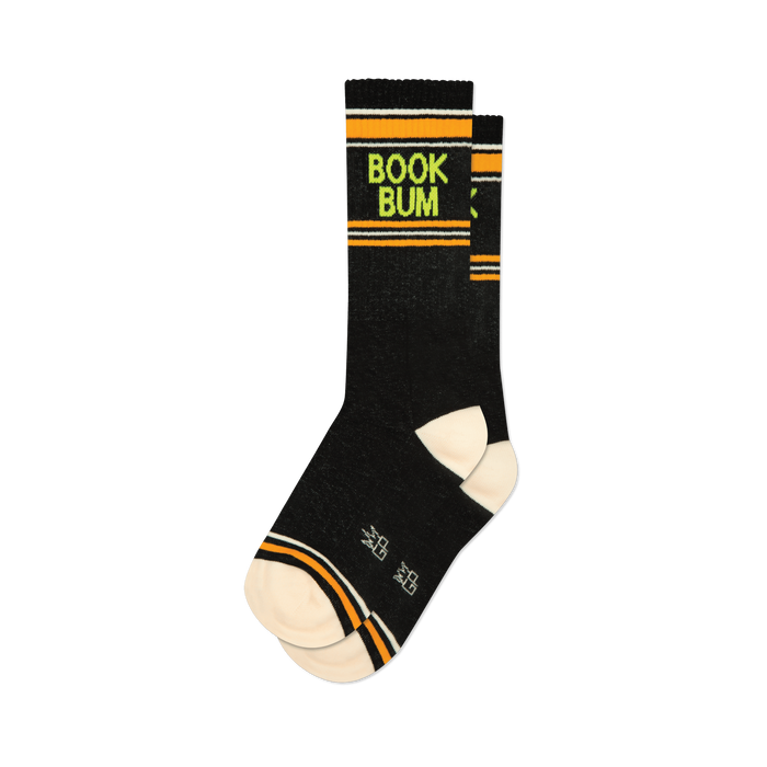 Pair of black crew socks with orange and lime green stripes and 'BOOK BUM' text. 